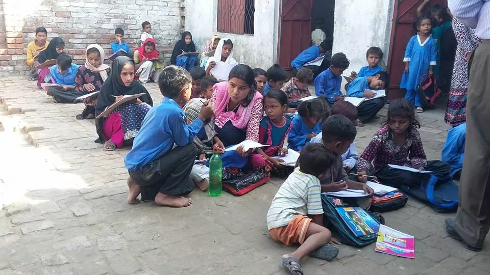 Christian education program teaching children from poor families in Pakistan