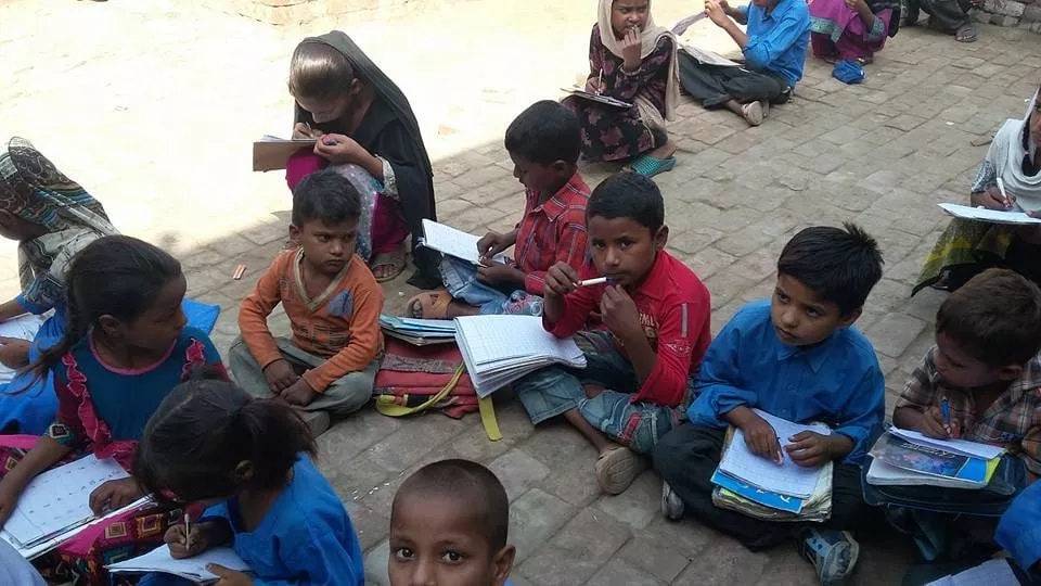 Youth receiving education and skills training through church support program